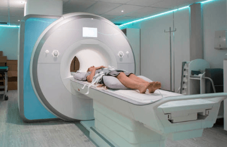 woman laying down in an MRI machine